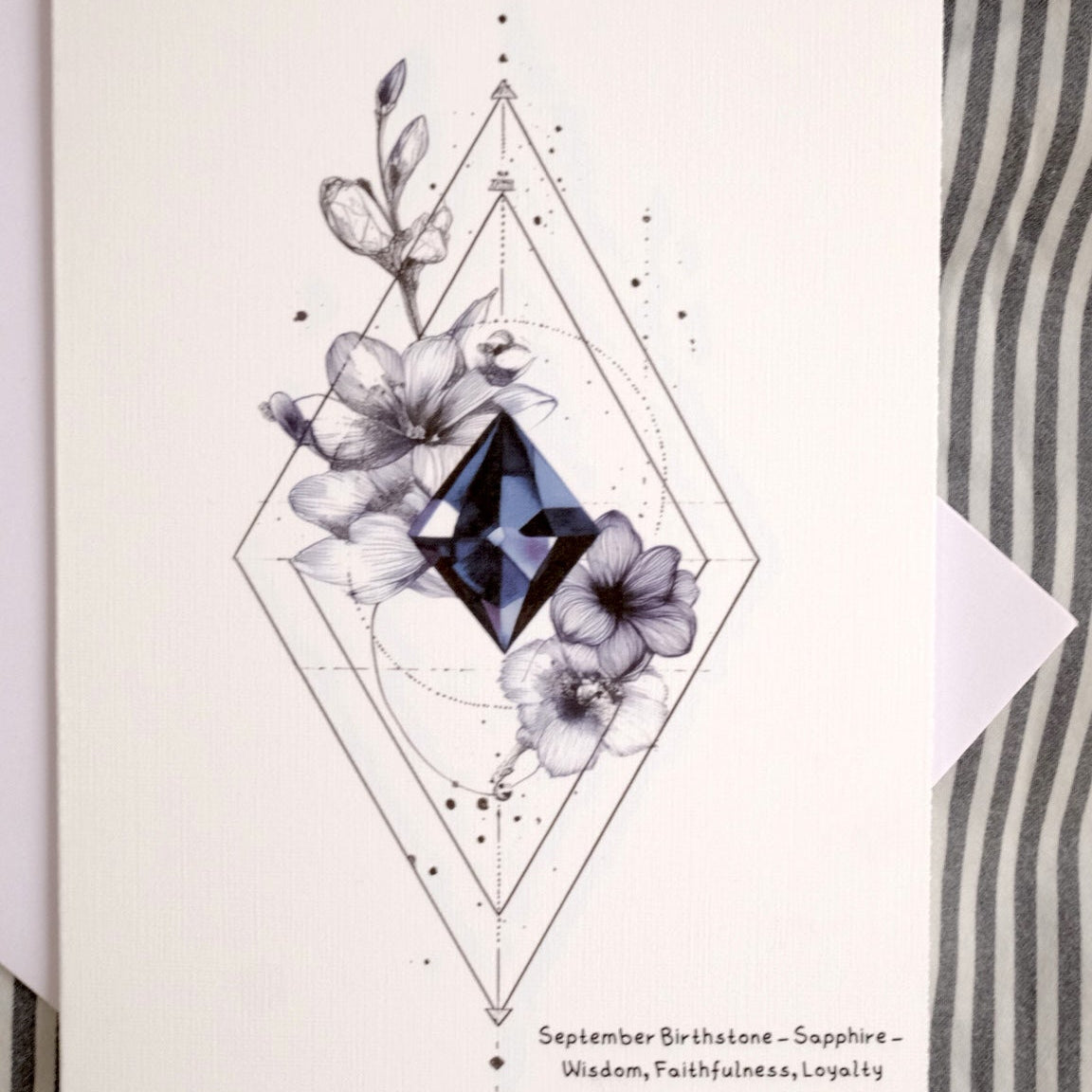 Greeting card with floral design and text on a striped background